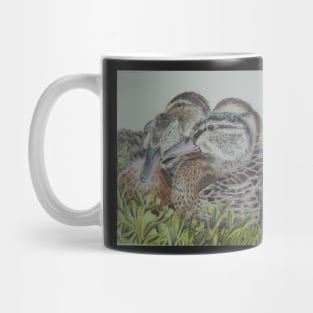 Ducklings in a huddle Mug